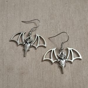 Silver tone bat hook earrings